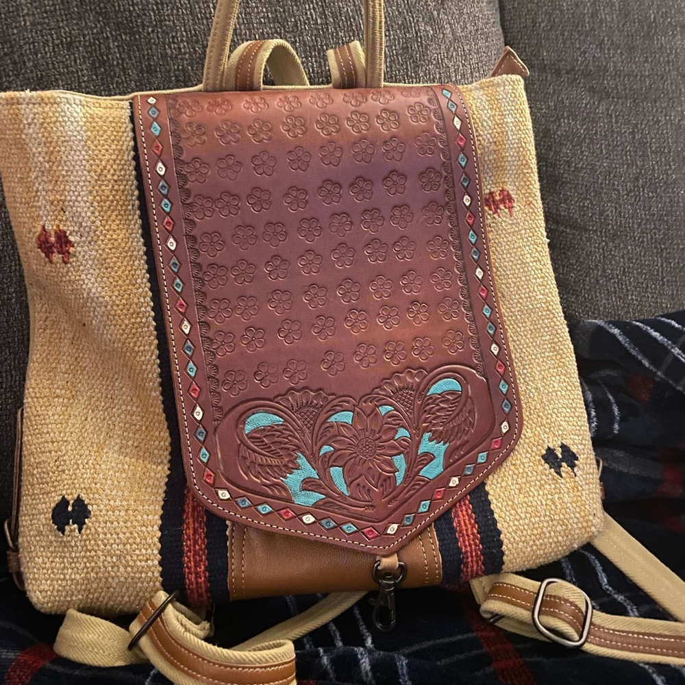 Myra bag tooled leather backpack